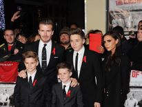 David and Victoria Beckham with their sons Brooklyn, Romeo and Cruz