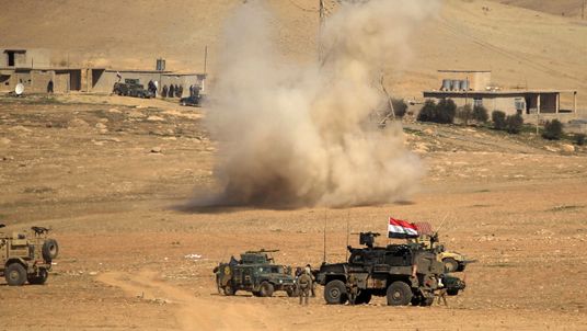 A rocket lands in the middle of Iraqi rapid response forces as fighting continued against IS in the push for Mosul