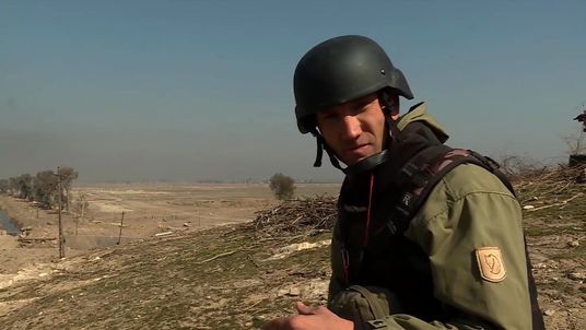 Sky's Alex Rossi with Iraqi troops on the outskirts of Mosul