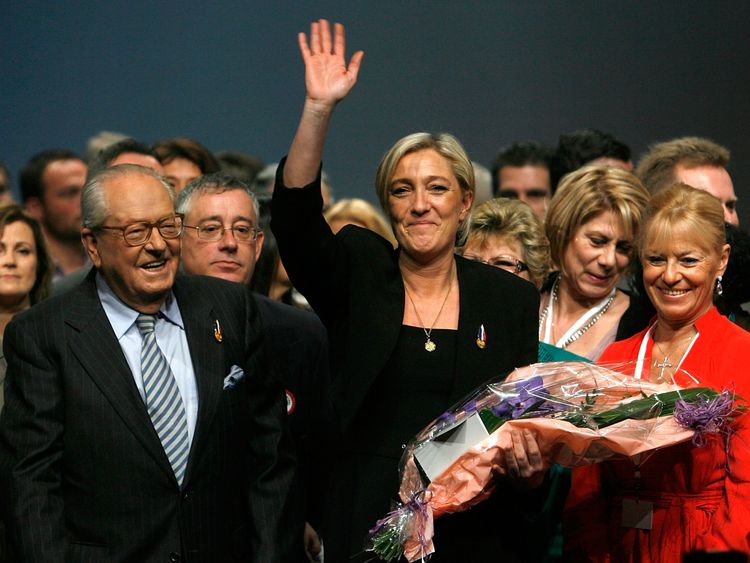 Marine Le Pen, flanked by her father, is named leader of the National Front in 2011