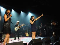 Joni Sledge, Debbie Sledge, and Kim Sledge perform onstage