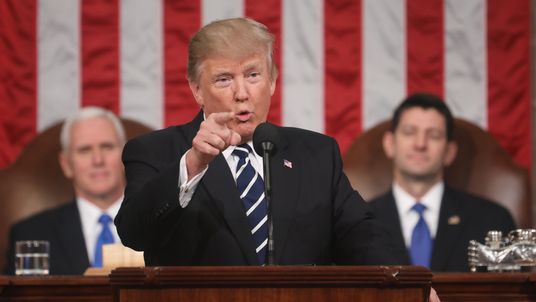 President Trump points at the audience during his first speech to a joint session of Congress. Pic: Getty