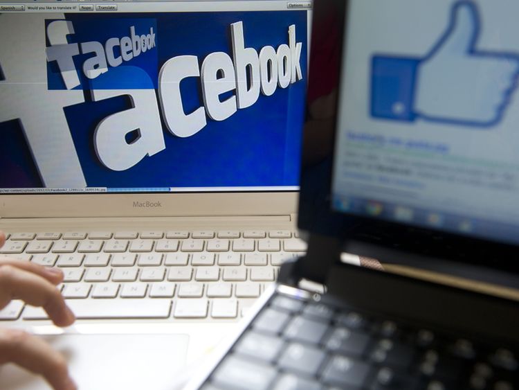 A boy surfs on the Facebook site in Medellin, Antioquia department, Colombia on May 12, 2012