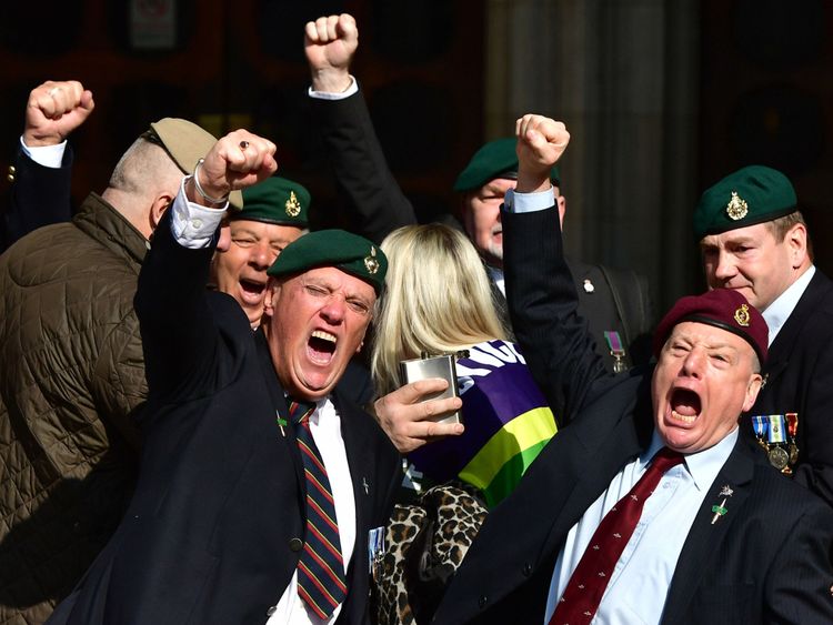 Supporters of Alexander Blackman celebrate outside the Royal Courts of Justice