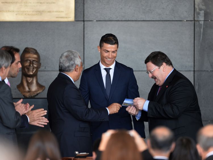 The Real Madrid and Portugal star smiles during the ceremony
