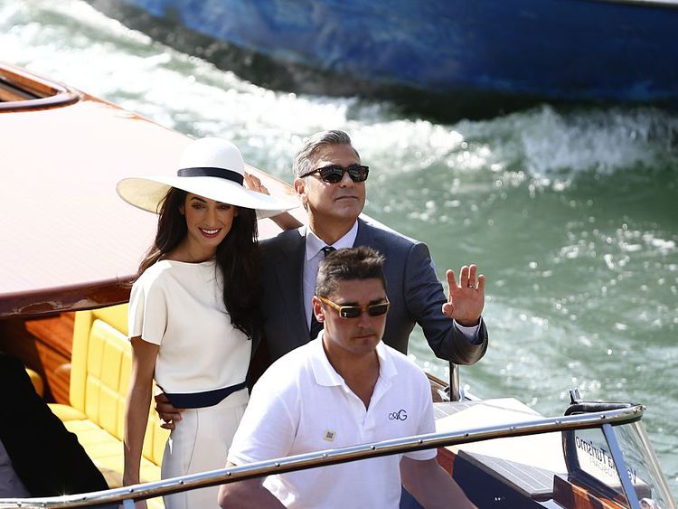 George Clooney and wife Amal took a boat ride under the Rialto Bridge after their wedding in 2014