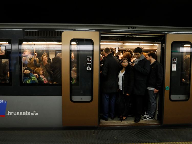Passengers observe a minute's silence on the Brussels metro