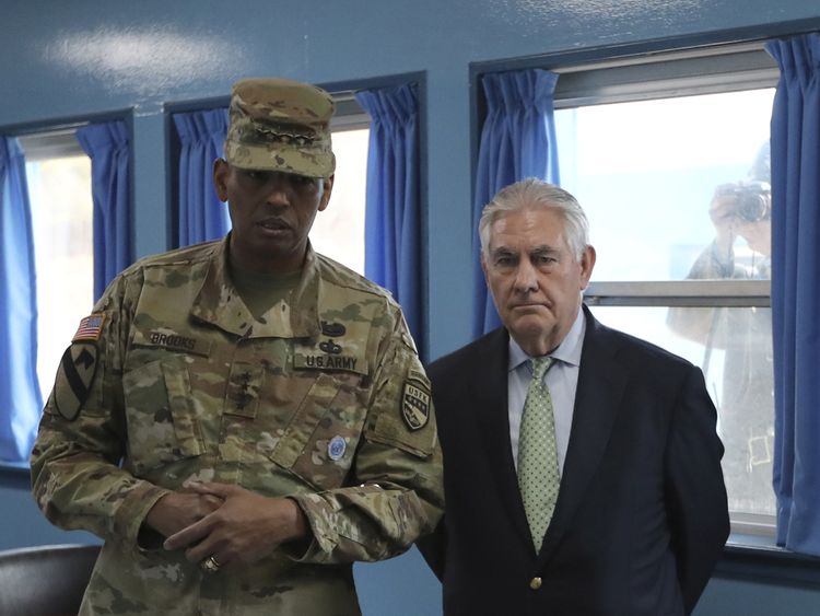 Mr Tillerson snapped by a North Korean soldier at the border village of Panmunjom