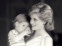 A picture of Diana holding Harry in Mallorca in 1988