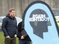 Prince Harry says as a result of talking to a "shrink" he is in a "good place now".