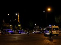 Police vehicles seen near the Eiffel Tower