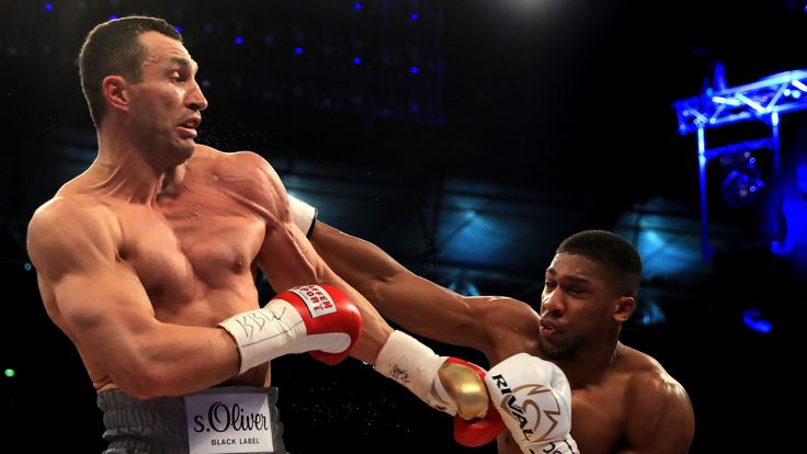 Anthony Joshua (White Shorts) and Wladimir Klitschko (Gray Shorts) in action during the IBF, WBA and IBO Heavyweight World Title bout at Wembley Stadium