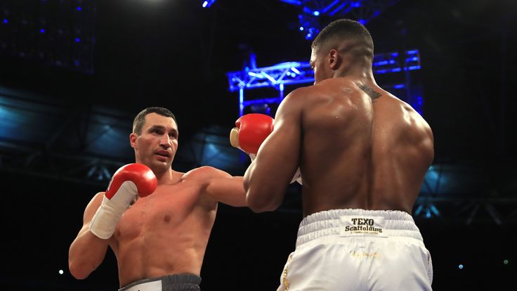 Anthony Joshua (White Shorts) and Wladimir Klitschko (Gray Shorts) in action during the IBF, WBA and IBO Heavyweight World Title bout at Wembley Stadium