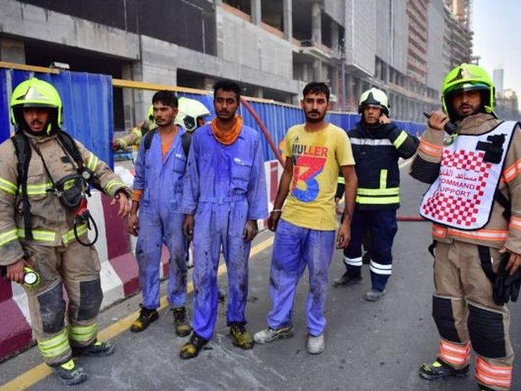 The workers who were rescued. Pic:Dubai Civil Defence/Instagram