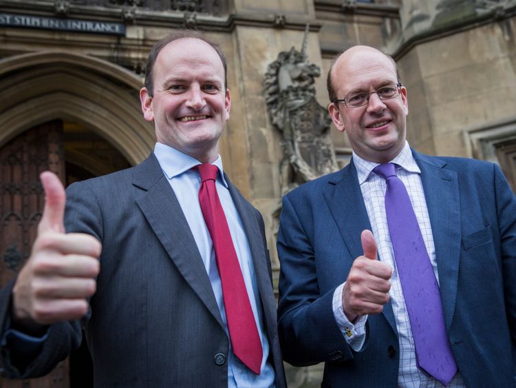 Mark Reckless and Douglas Carswell pose outside the Houses of Parliament after being elected UKIP MPs