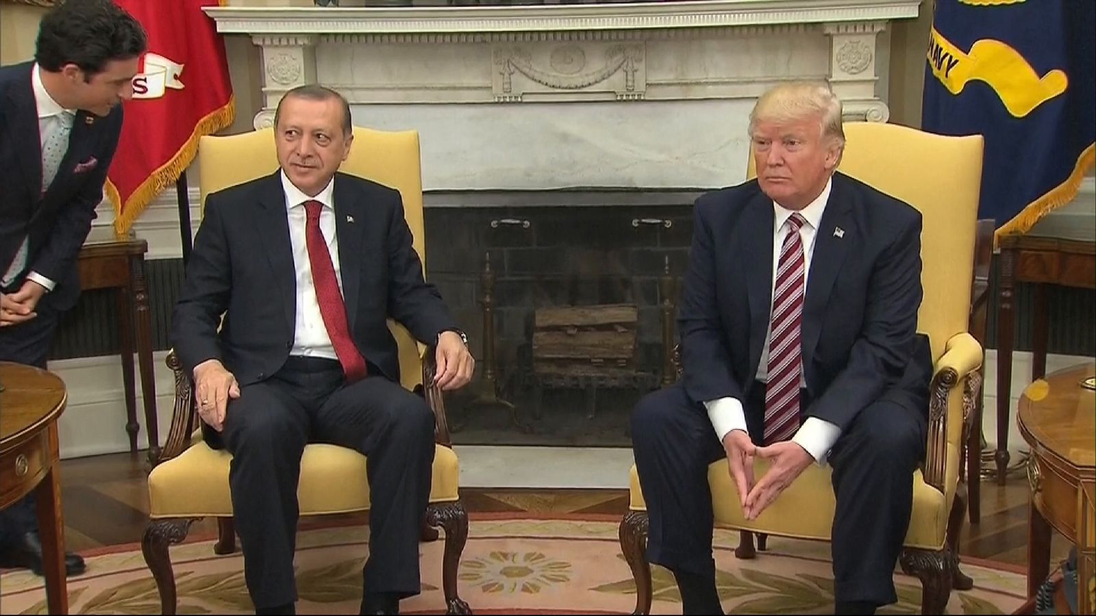 Donald Trump blanks questions from journalists about classified information and Russia while the President of Turkey looks on