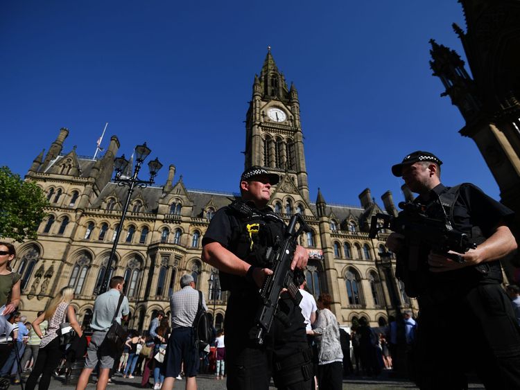 Armed police in front of the Town Hall in Albert Square, Manchester 