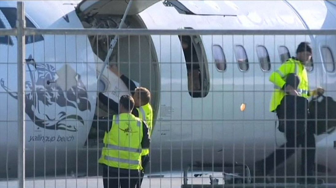 Man arrested over note found in Australian airliner toilet