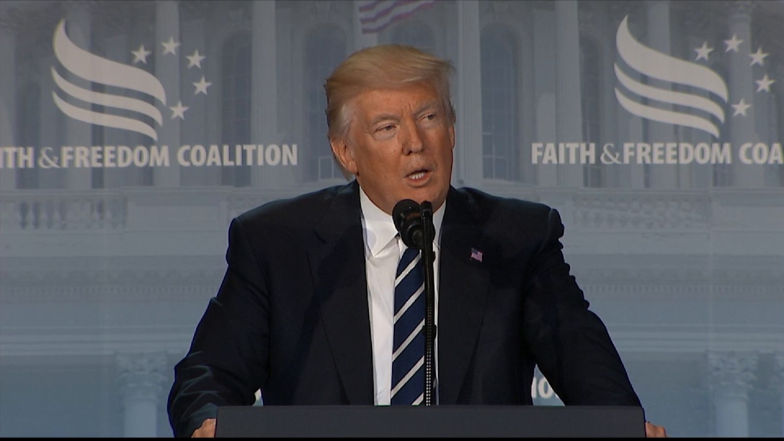 Donald Trump makes oblique references to being 'under siege' at an address to the Faith and Freedom Coalition