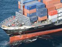 A Philippine-flagged merchant vessel, damaged by colliding with the Arleigh Burke-class guided-missile destroyer USS Fitzgerald. Pic: Kyodo