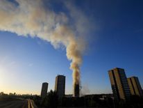 The A40 road is closed as flames and smoke billow from a tower block at Latimer Road in West London