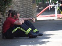 Weary firefighters