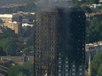 Smoke was still coming from the tower hours after the fire began