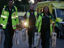 Supplies of oxygen are brought to the scene