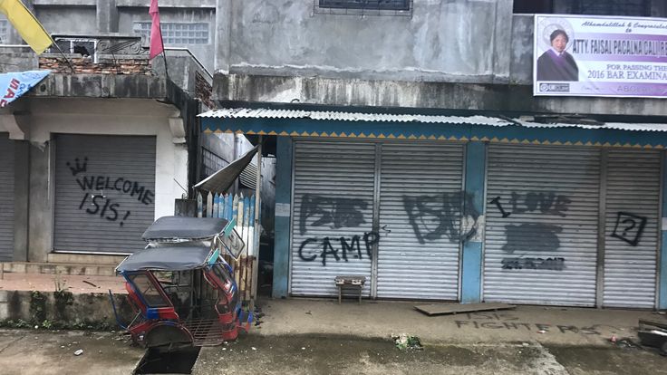 "WELCOME ISIS!" one scrawled message read