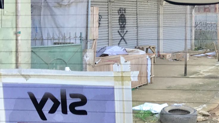 A skull and cross-bones beneath an ISIS slogan was scrawled on the wall