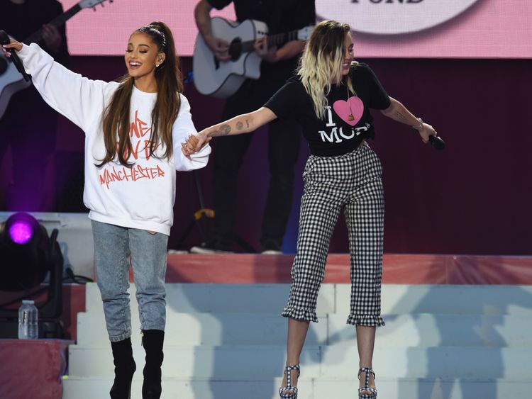 Ariana Grande on stage with Miley Cyrus at the One Love Manchester concert