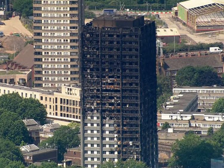 May calls for major investigation of cladding
