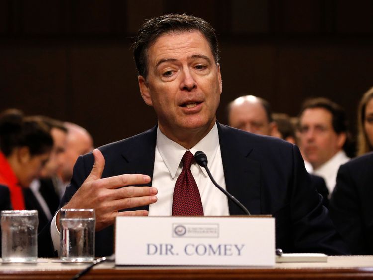 Former FBI Director James Comey testifies before a Senate Intelligence Committee hearing