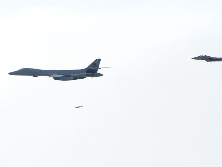 The practice bomb run by US planes has been criticised by Pyongyang