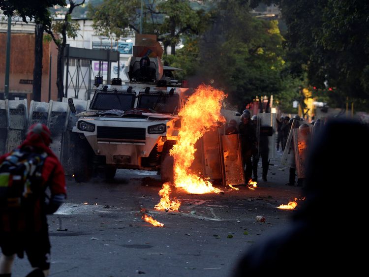 A riot security forces vehicle is set on fire