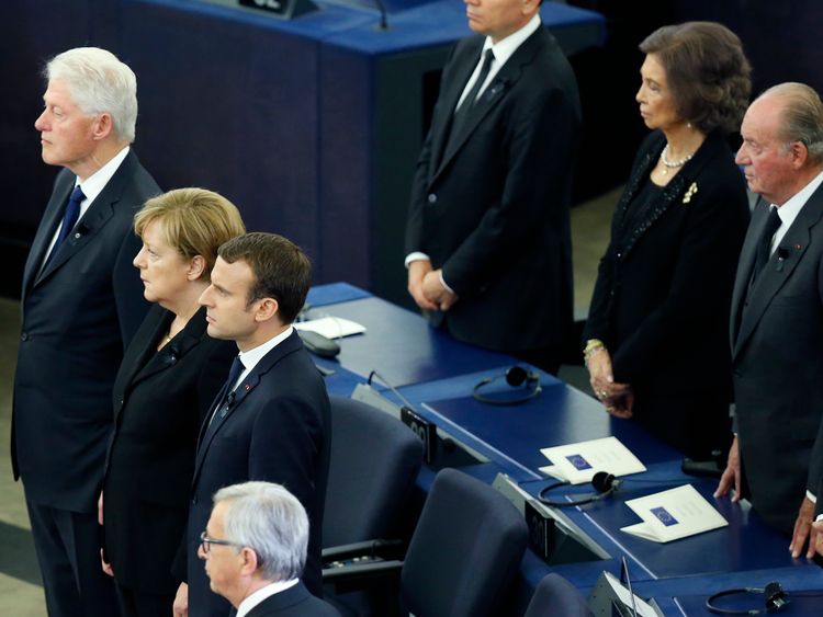 Former U.S. President Bill Clnton, German Chancellor Angela Merkel, French President Emmanuel Macron, European Commission President Jean-Claude Juncker, former Spanish Queen Sofia and former Spanish King Juan Carlos attend a memorial ceremony in honour of late former German Chancellor Helmut Kohl, at the European Parliament in Strasbourg, France, July 1, 2017. REUTERS/Francois Lenoir