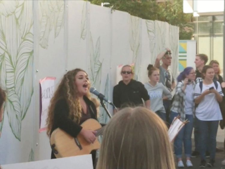 Fans sing outside Wembley stadium in honour of Adele