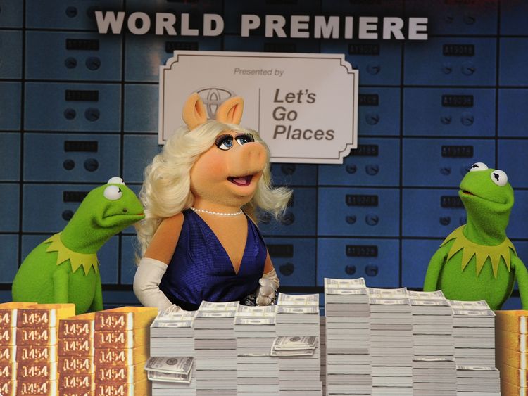 HOLLYWOOD, CA - MARCH 11: (L-R) Constantine, Miss Piggy and Kermit arrive for the premiere of Disney's 'Muppets Most Wanted' at the El Capitan Theatre on March 11, 2014 in Hollywood, California. (Photo by Kevin Winter/Getty Images)