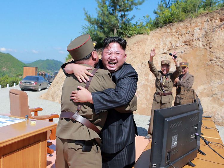 Kim Jong-Un celebrates the ICBM launch with military officers