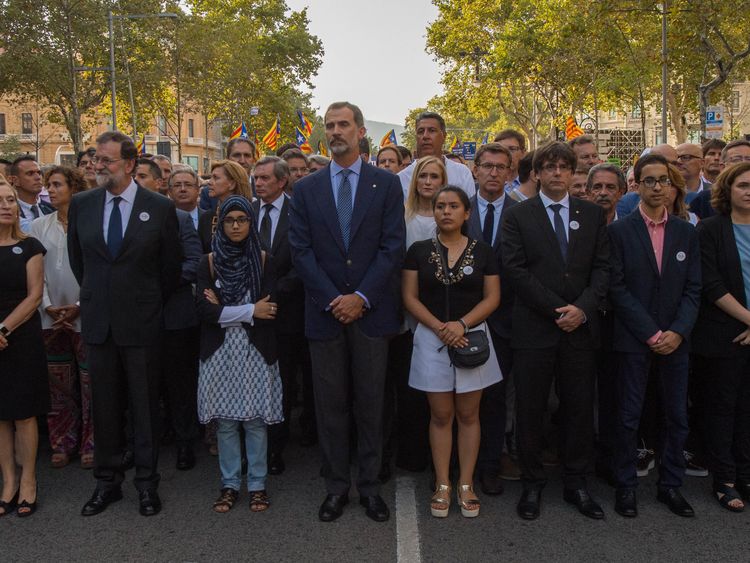 King Felipe VI of Spain (centre) was at the head of the march