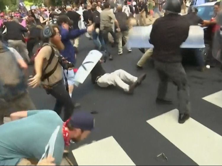 Some were seen holding shields as skirmishes took place