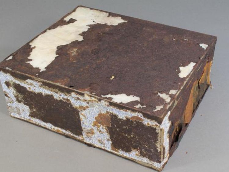 The tin containing the cake was heavily damaged. Pic: Antarctic Heritage Trust