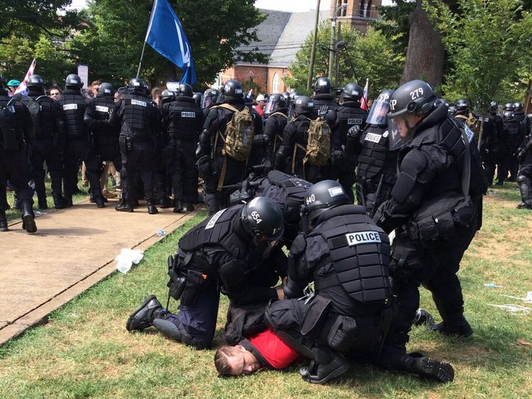 Police arrest one of the activists in Charlottesville. Pic: Virginia State Police