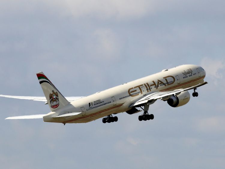 An Etihad Airways Boeing 777-3FX aircraft takes off at the Charles de Gaulle airport in Roissy, France, August 9, 2016