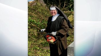 Sister Margaret Ann slices up fallen trees with a chainsaw after Hurricane Irma