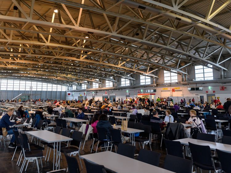 Frankfurt residents gather at a collection centre
