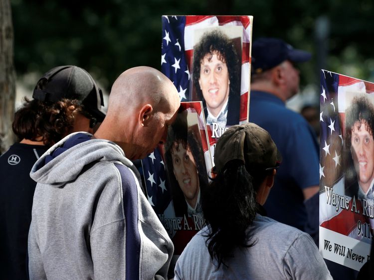 Relatives of victim Wayne A. Russo at the New York ceremony