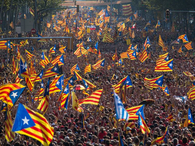 Demonstrators march in support of Catalonian independence on 11 September 2017
