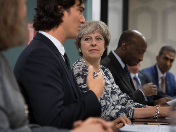 Tech giants must go further to tackle terror -Theresa May