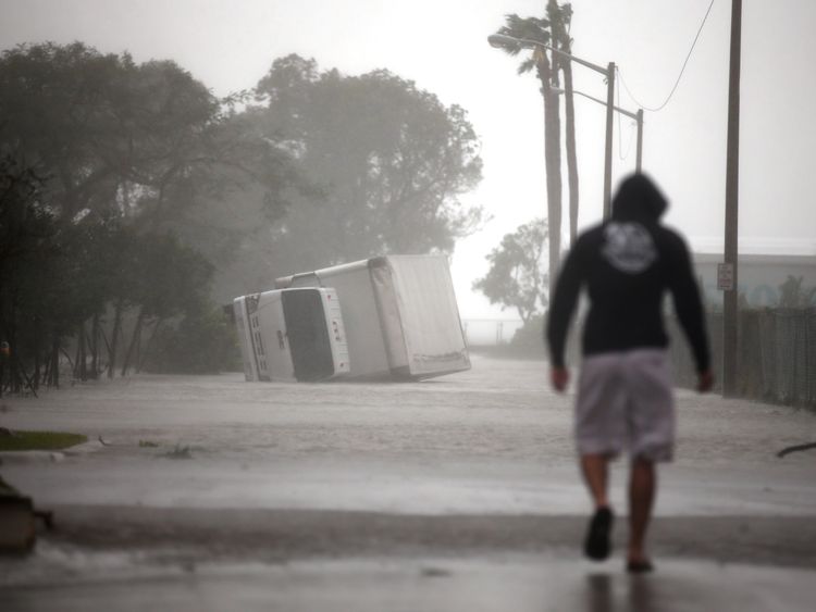 A truck is turned over as Hurricane Irma passes Miami